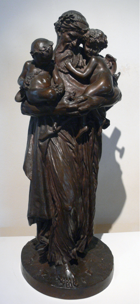 A bronze statue of a man holding two children