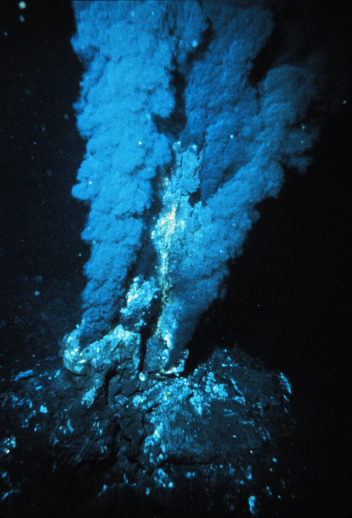 Submarine vent on the ocean floor: a source of energy for chemosynthesis.