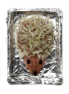 hedgehog made of raw pork and onions