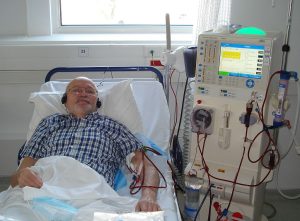 Patient on hemodialysis machine receiving treatment