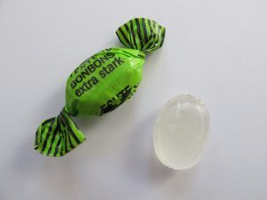 Wrapped and unwrapped Hustenbonbon menthol cough drops
