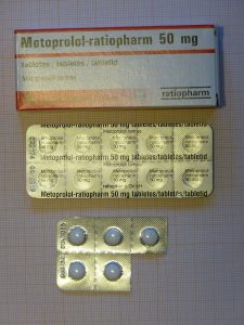 A box of Metoprolol-ratipharm 50 milligram tablets and blister packs of these tablets. The original author description is "quick help against hypertensive emergency."