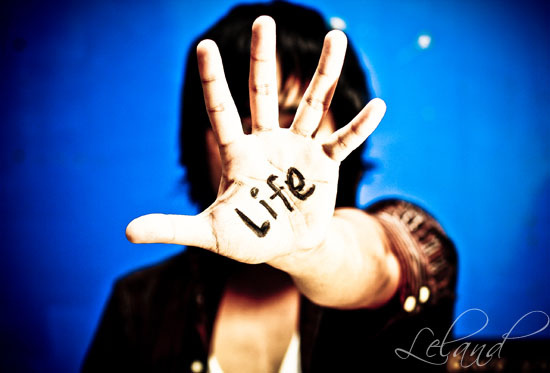 Descriptive image showing a person’s open hand, with the word ‘Life’ written on the palm. (4.5.0)
