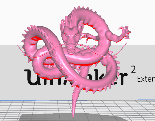 A picture of a 3D design of a dragon in pink