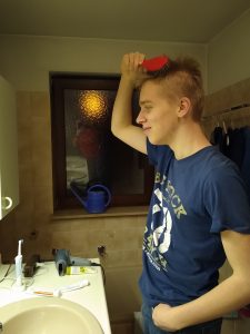 Nico combing his hair