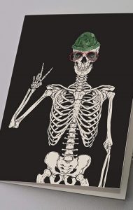 a skeleton with a green hat and sunglasses