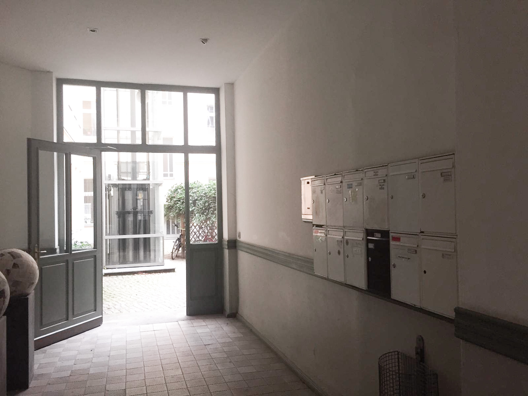 mailboxes in an apartment building (built into the wall in the foyer)